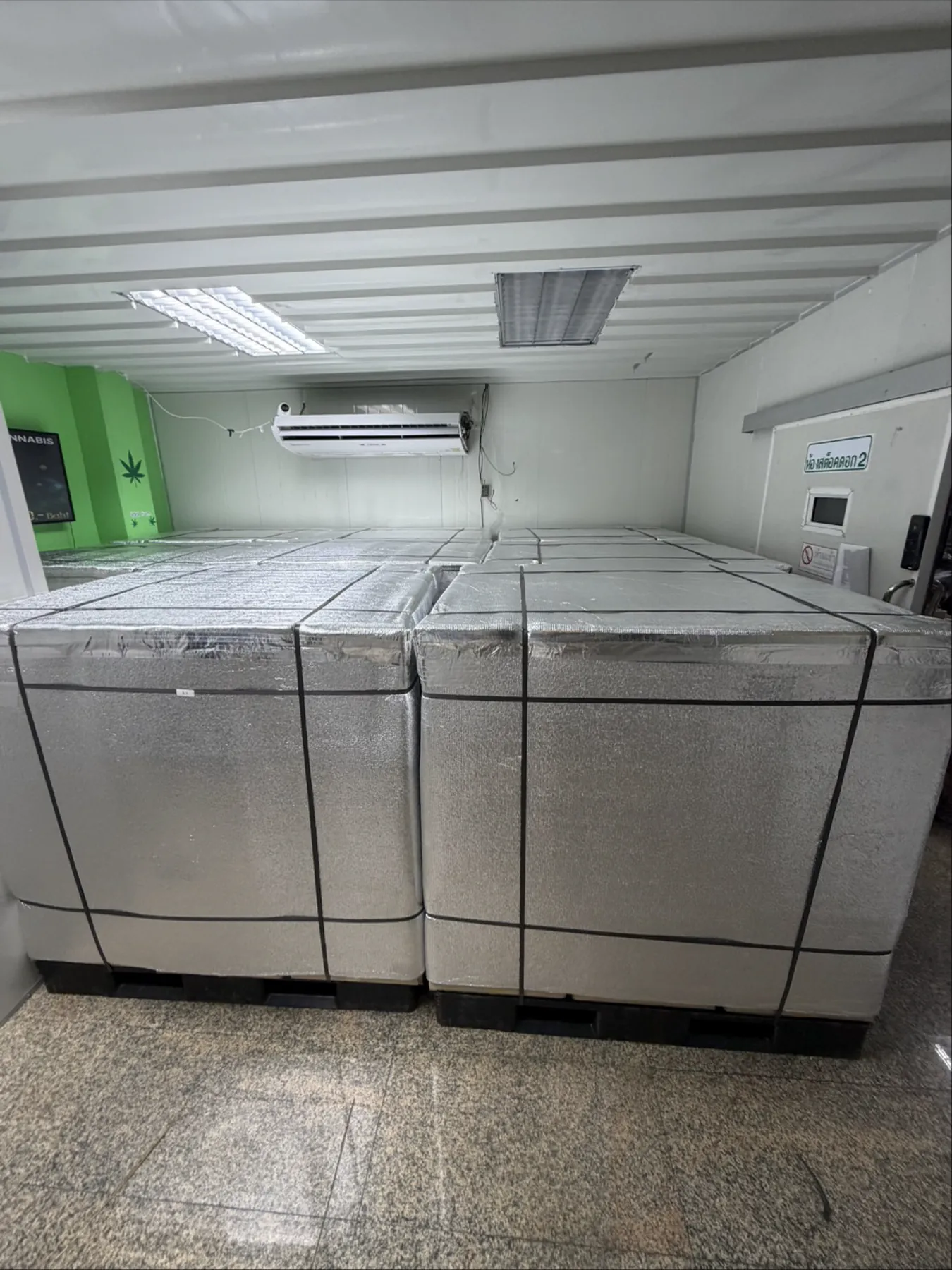 Shrink wrapped pallets staged in the climate controlled stock room