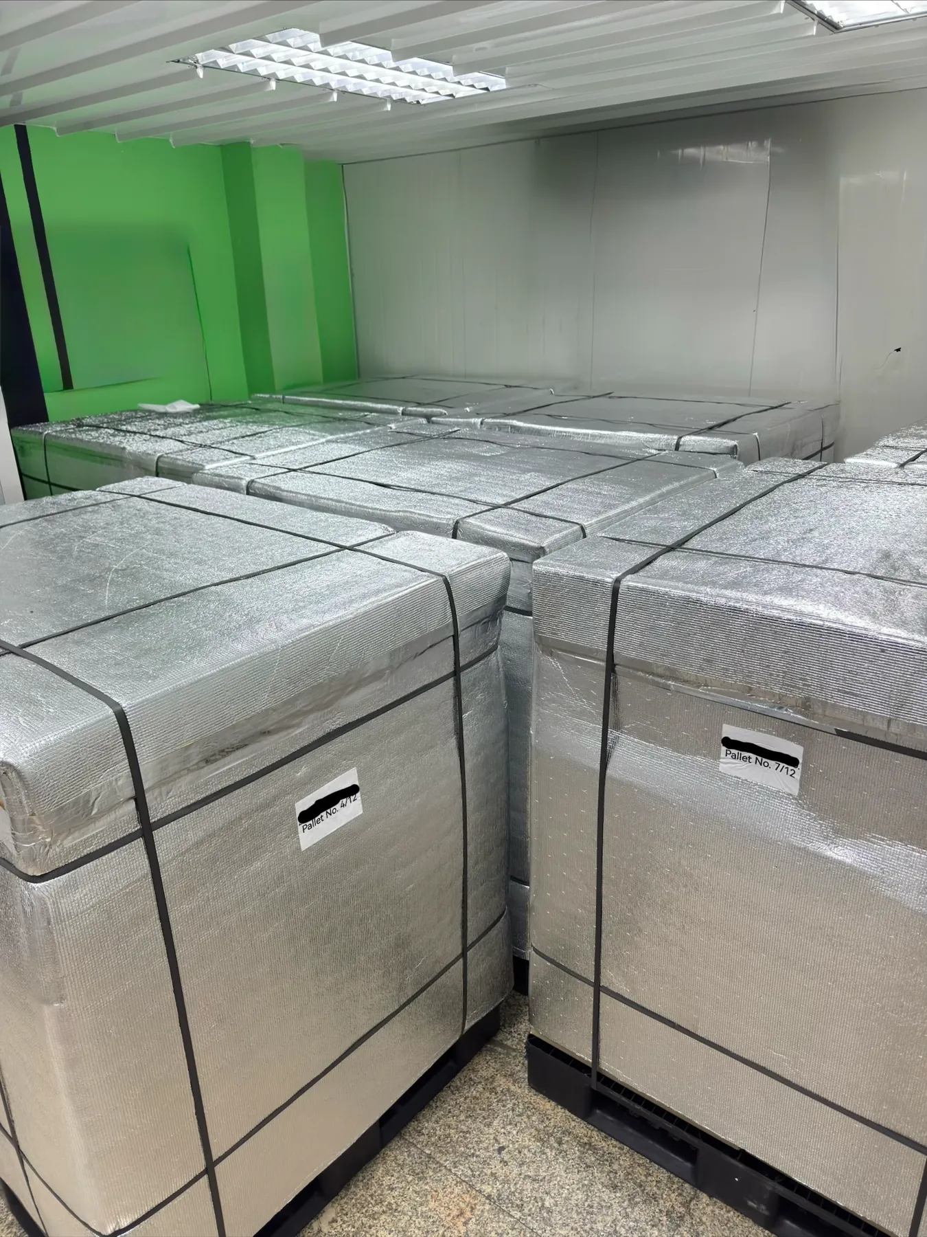 Strapped export pallets lined up for collection